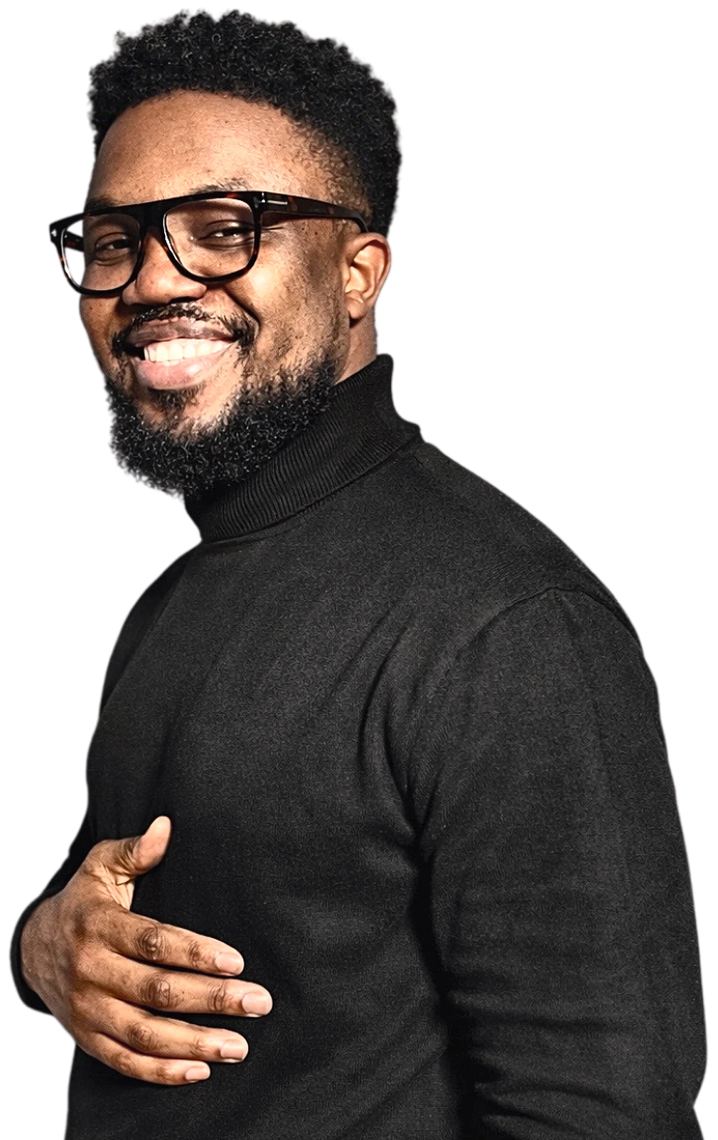 Sydney Scott Sam in a black turtleneck and glasses, smiling, hand on his chest